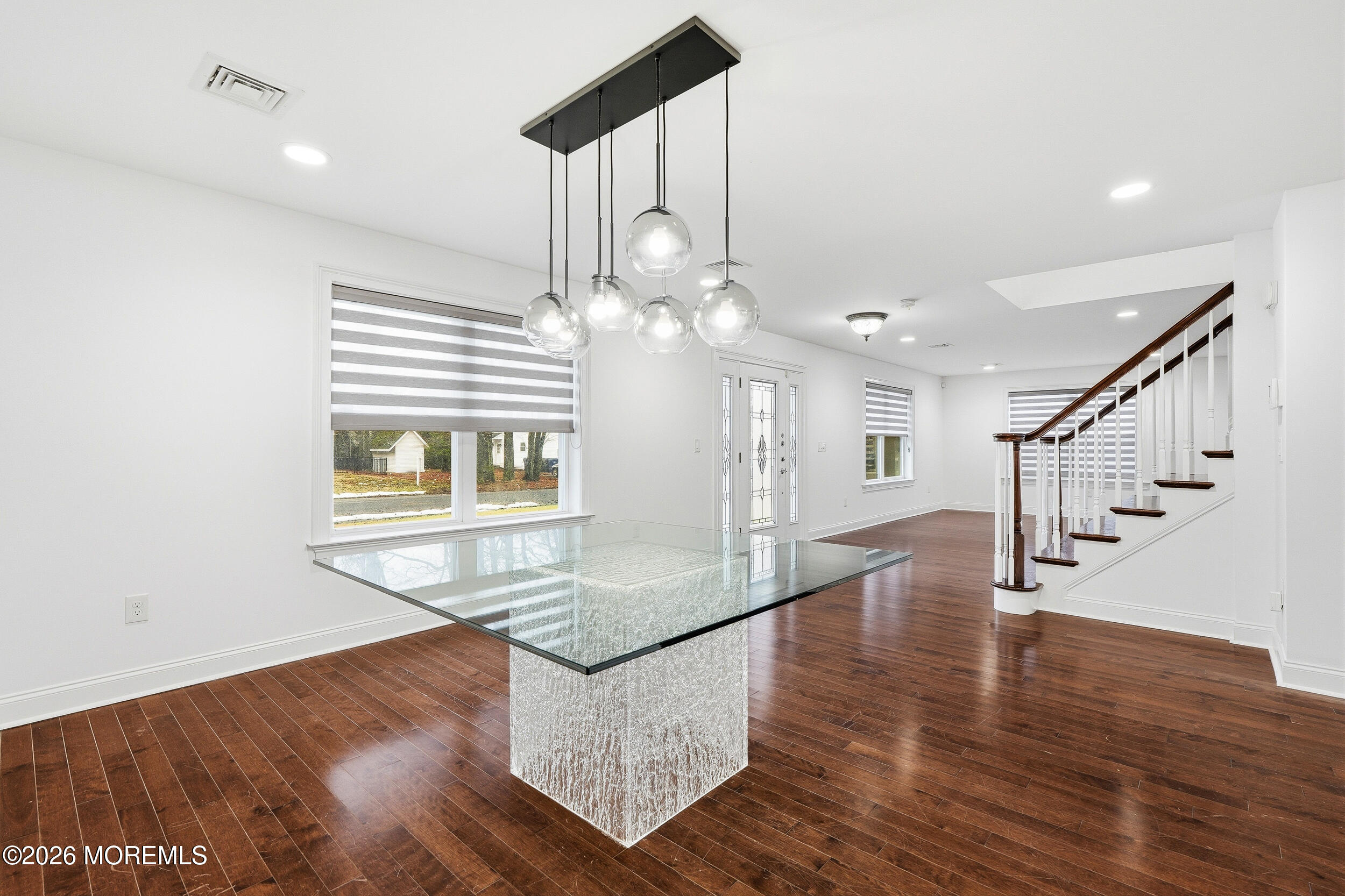 232 Woodcrest Road Oakhurst, NJ 07755 - Photo 11 of 49 a view of entryway and hall with wooden floor