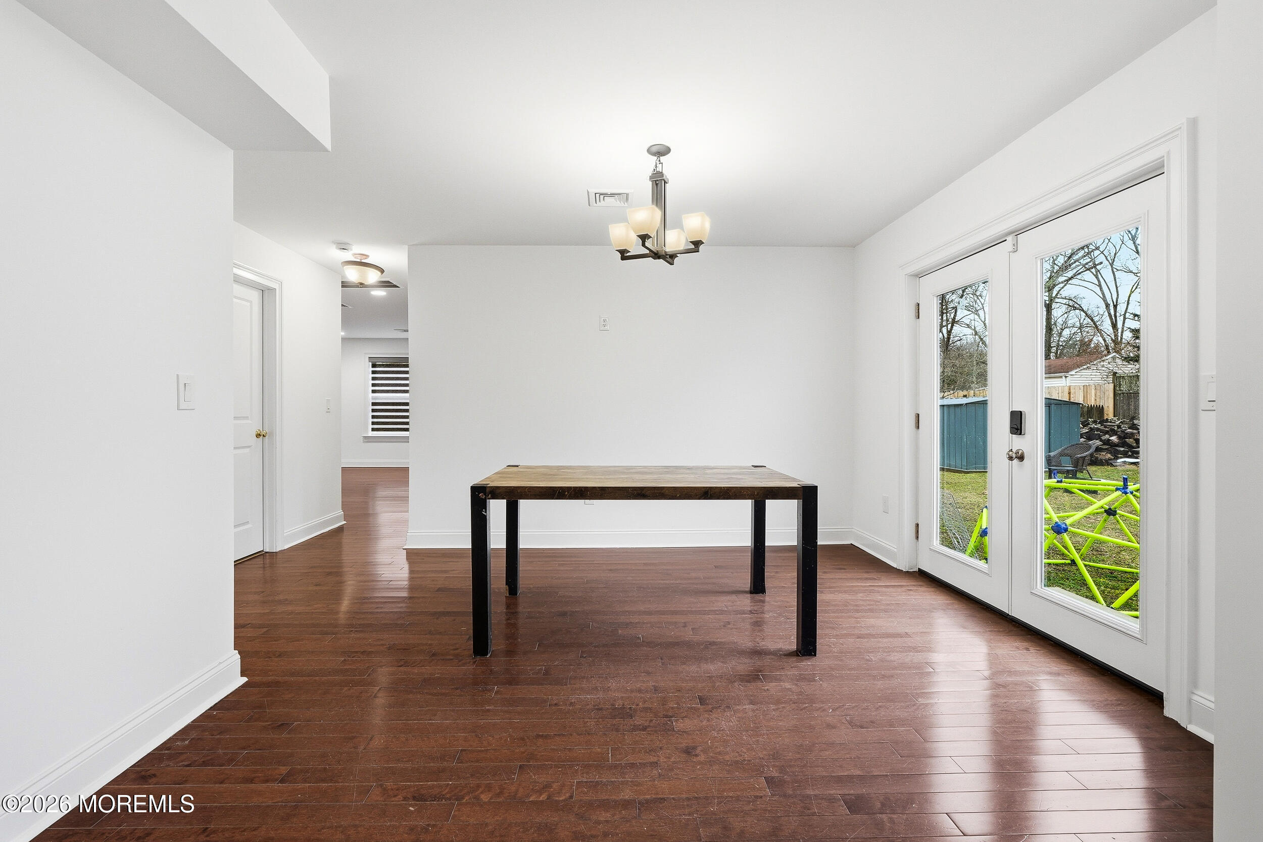 232 Woodcrest Road Oakhurst, NJ 07755 - Photo 19 of 49 a view of an entryway with wooden floor