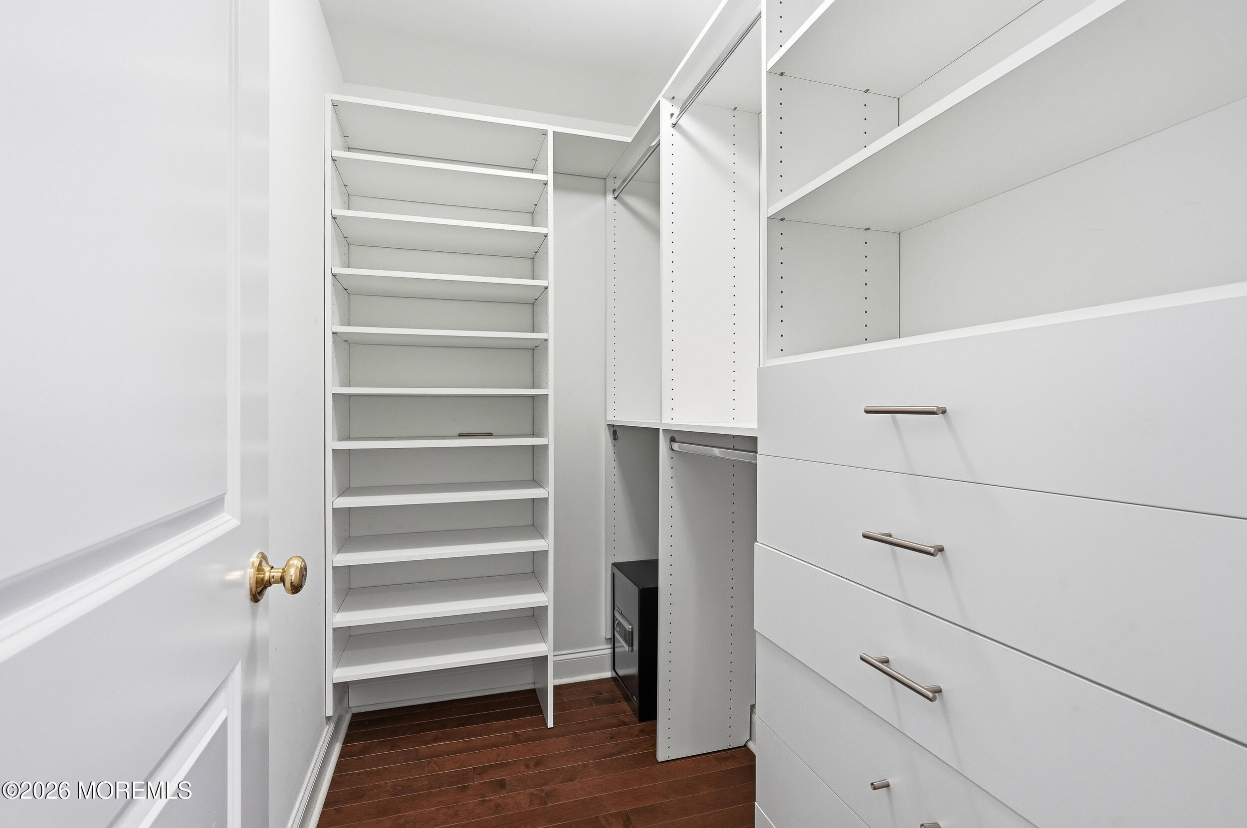 232 Woodcrest Road Oakhurst, NJ 07755 - Photo 42 of 49 a view of walk in closet with empty racks