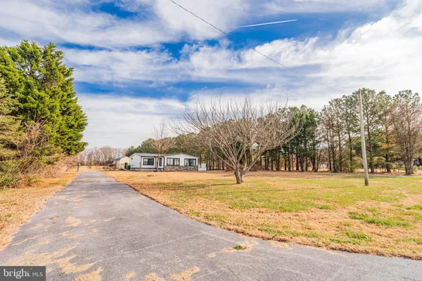 a view of an swimming pool and an outdoor space