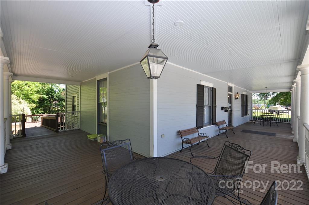 5 Oak Grove Street, Unit 4 Mount Holly, NC 28120 - Photo 4 of 10 a living room with furniture and a window