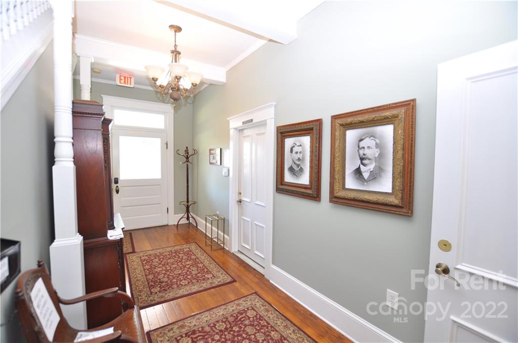 5 Oak Grove Street, Unit 4 Mount Holly, NC 28120 - Photo 8 of 10 a view of a livingroom with furniture and window