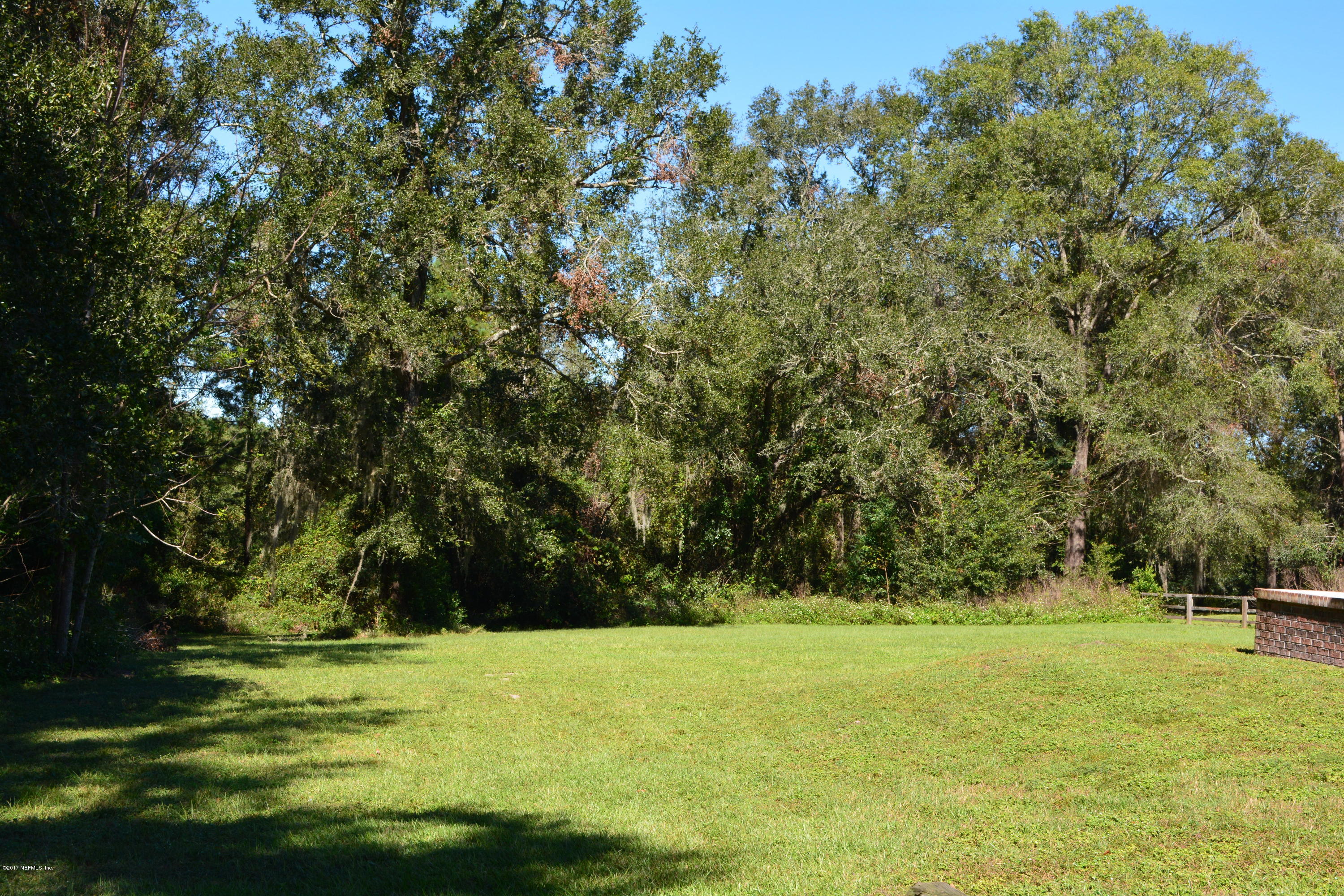 5345 Eva Jones Road Macclenny, FL 32063 - Photo 19 of 22 a view of outdoor space with trees