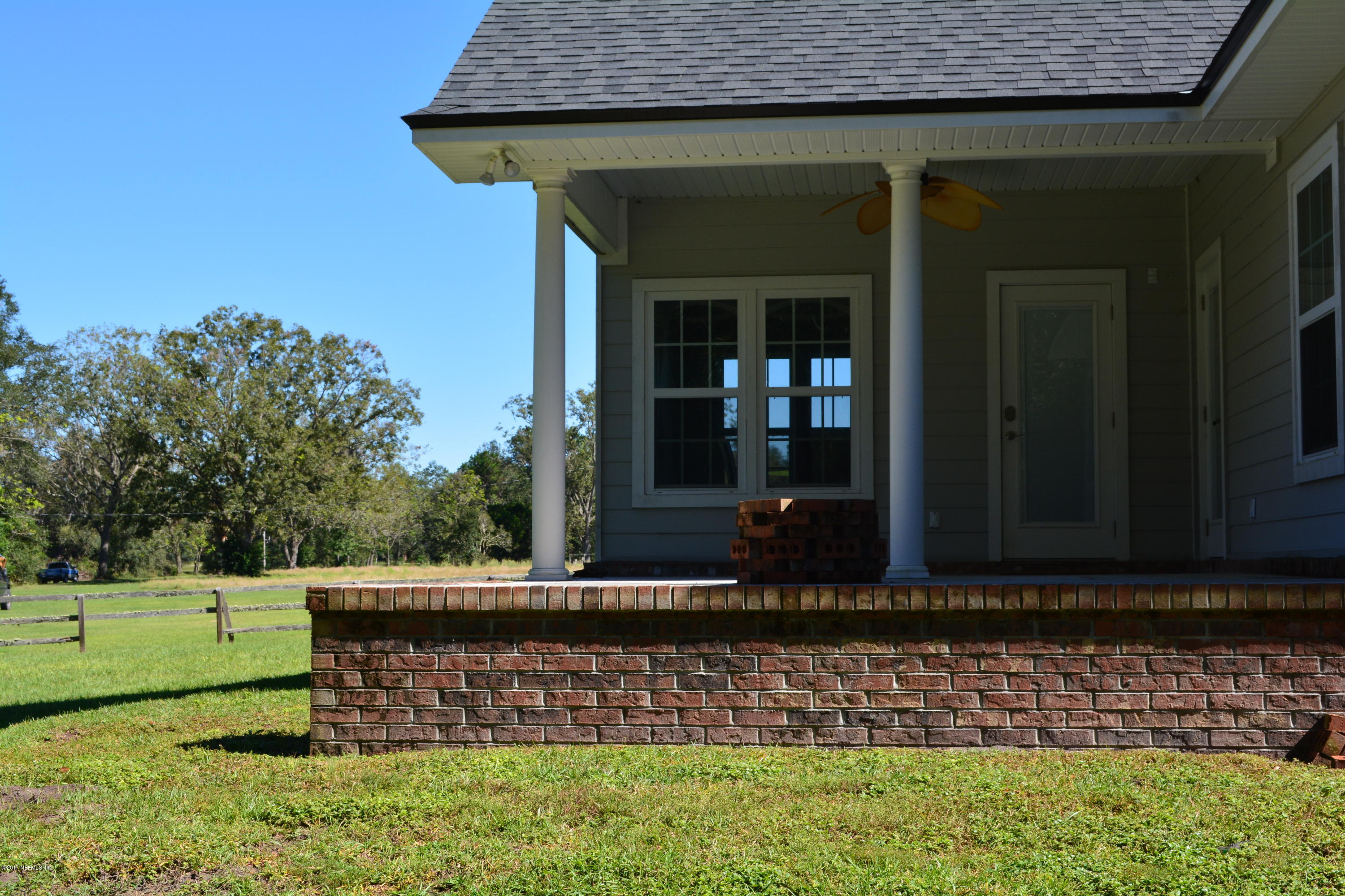 5345 Eva Jones Road Macclenny, FL 32063 - Photo 5 of 22 a view of house with a backyard
