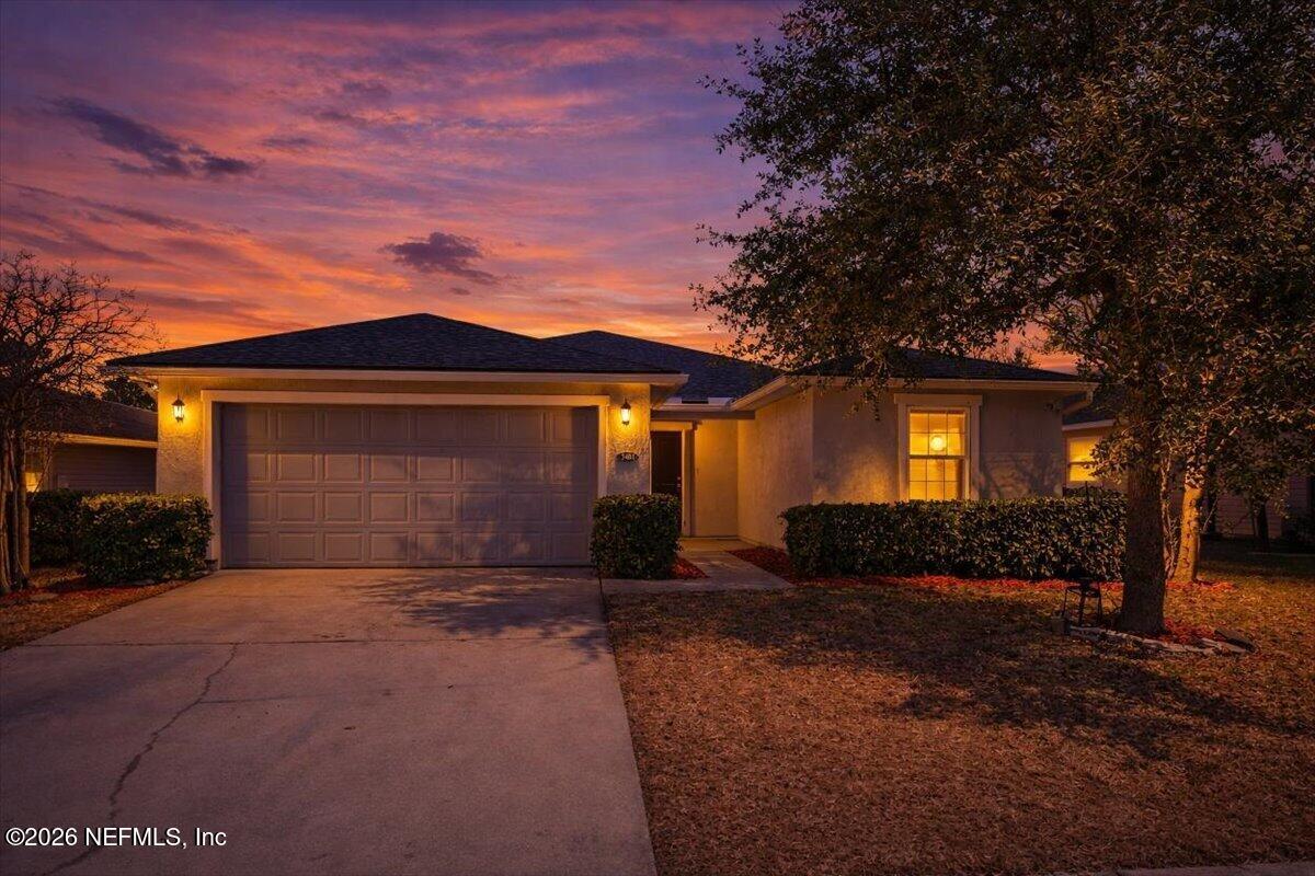 7401 Steventon Way Jacksonville, FL 32244 - Photo 1 of 32 front view of a house with a yard