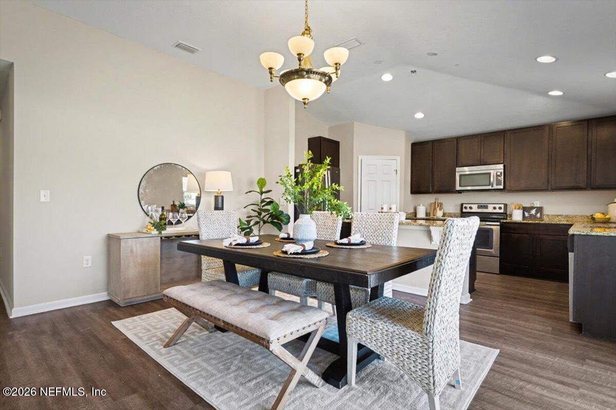 7401 Steventon Way Jacksonville, FL 32244 - Photo 11 of 32 a view of a dining room with furniture