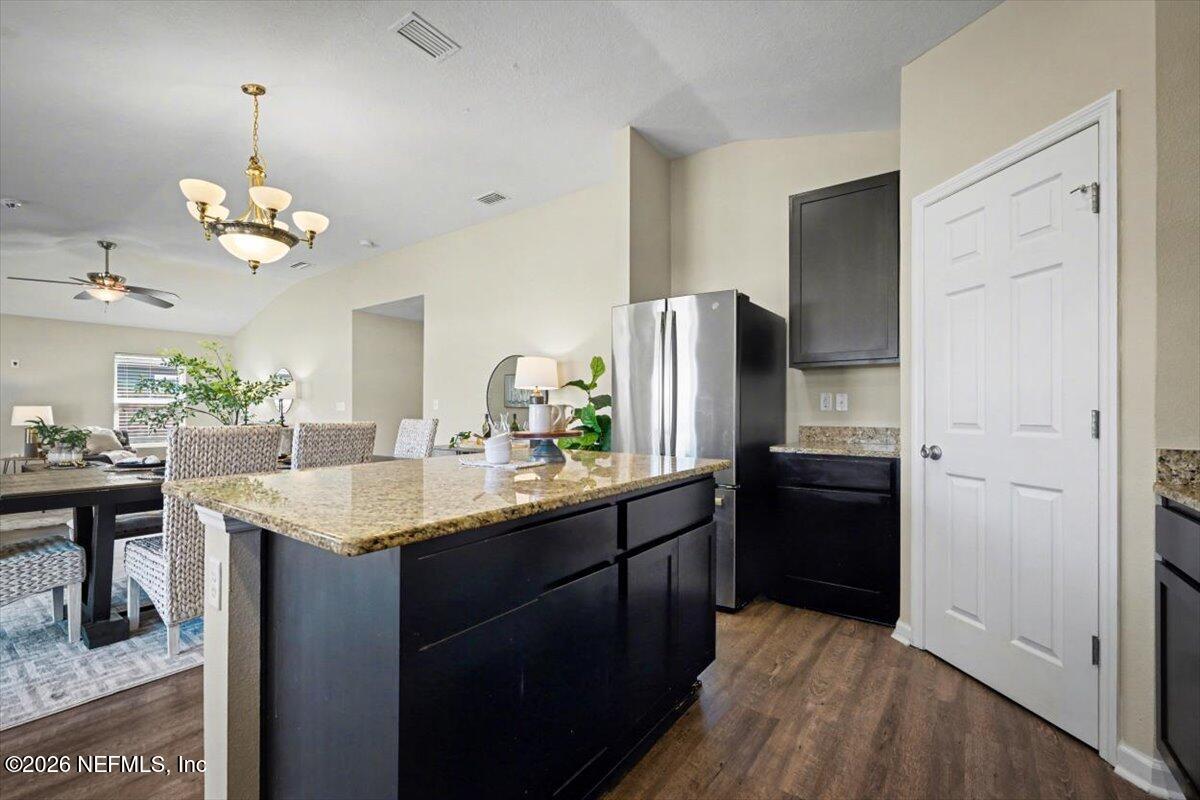 7401 Steventon Way Jacksonville, FL 32244 - Photo 13 of 32 a kitchen with cabinets stainless steel appliances a sink and kitchen view