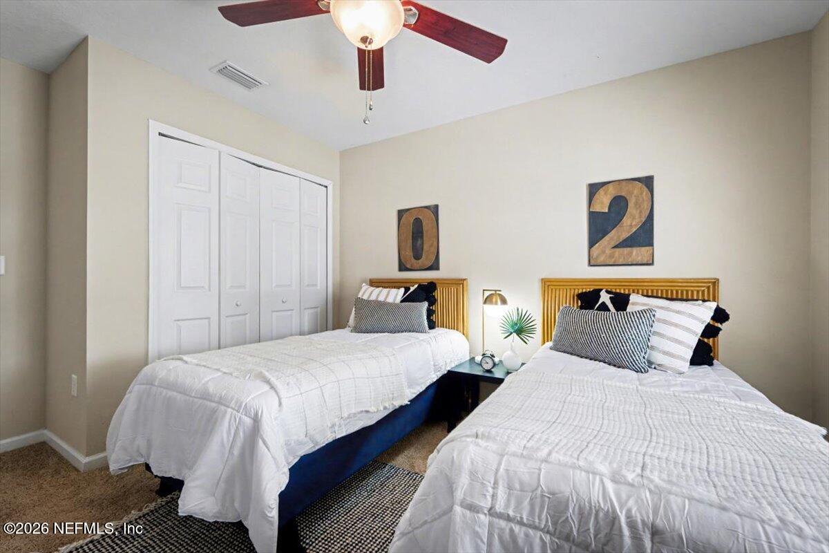 7401 Steventon Way Jacksonville, FL 32244 - Photo 23 of 32 a bedroom with bed and window