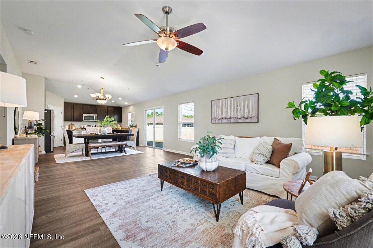 7401 Steventon Way Jacksonville, FL 32244 - Photo 8 of 32 a living room with furniture and wooden floor