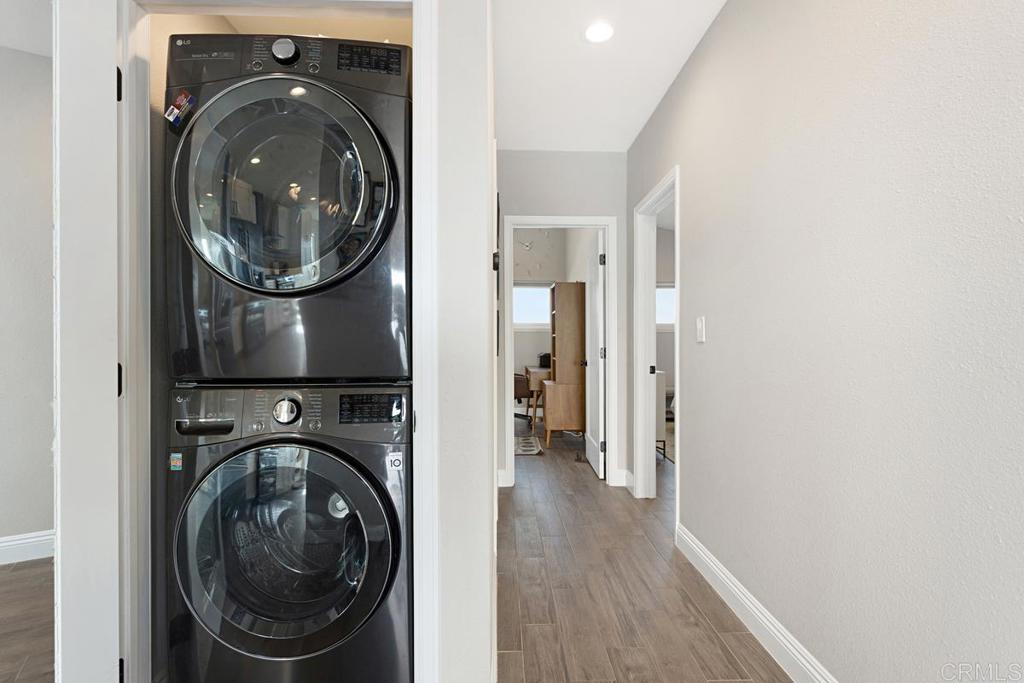 620 West Solana Circle, Unit 3A Solana Beach, CA 92075 - Photo 16 of 37 a view of a hallway with washer and dryer