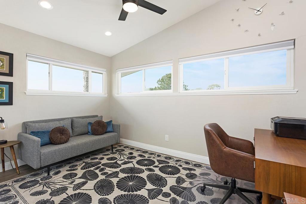 620 West Solana Circle, Unit 3A Solana Beach, CA 92075 - Photo 21 of 37 a living room with furniture and a window