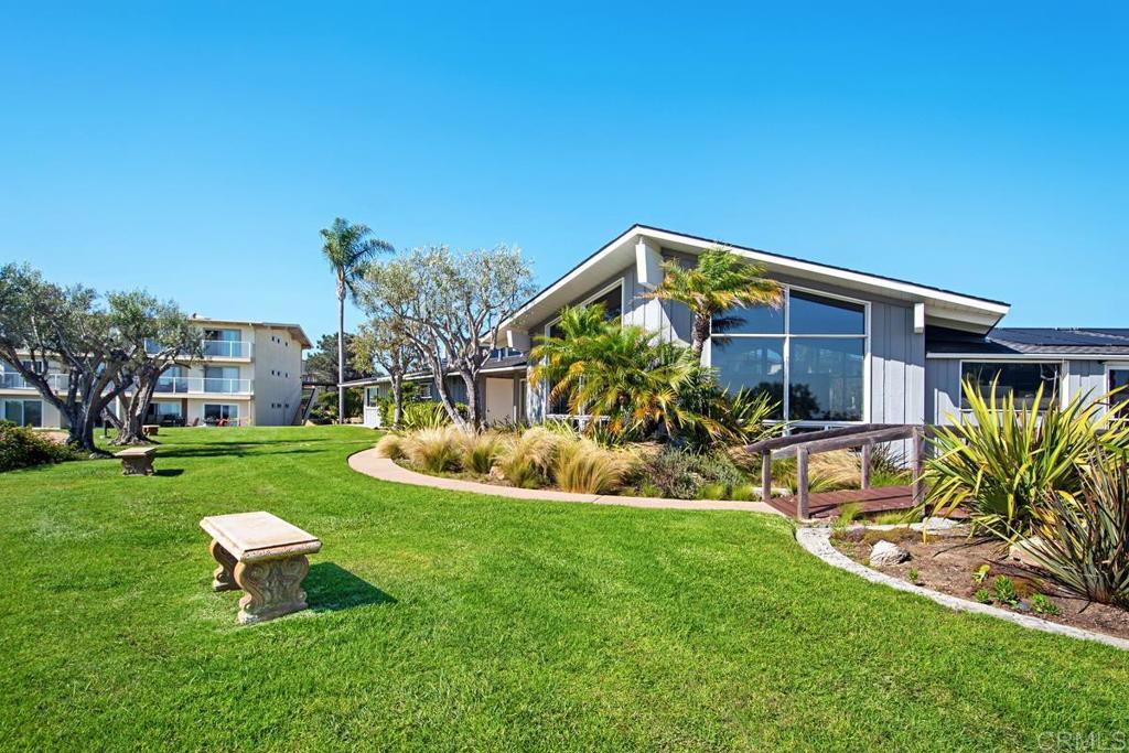 620 West Solana Circle, Unit 3A Solana Beach, CA 92075 - Photo 31 of 37 a view of a house with a yard and porch