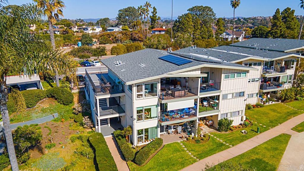 620 West Solana Circle, Unit 3A Solana Beach, CA 92075 - Photo 34 of 37 an aerial view of multiple houses with a yard