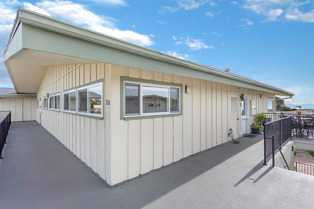 620 West Solana Circle, Unit 3A Solana Beach, CA 92075 - Photo 37 of 37 a porch with table and chairs