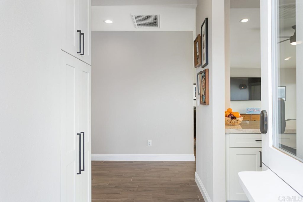 620 West Solana Circle, Unit 3A Solana Beach, CA 92075 - Photo 6 of 37 a view of hallway with wooden floor