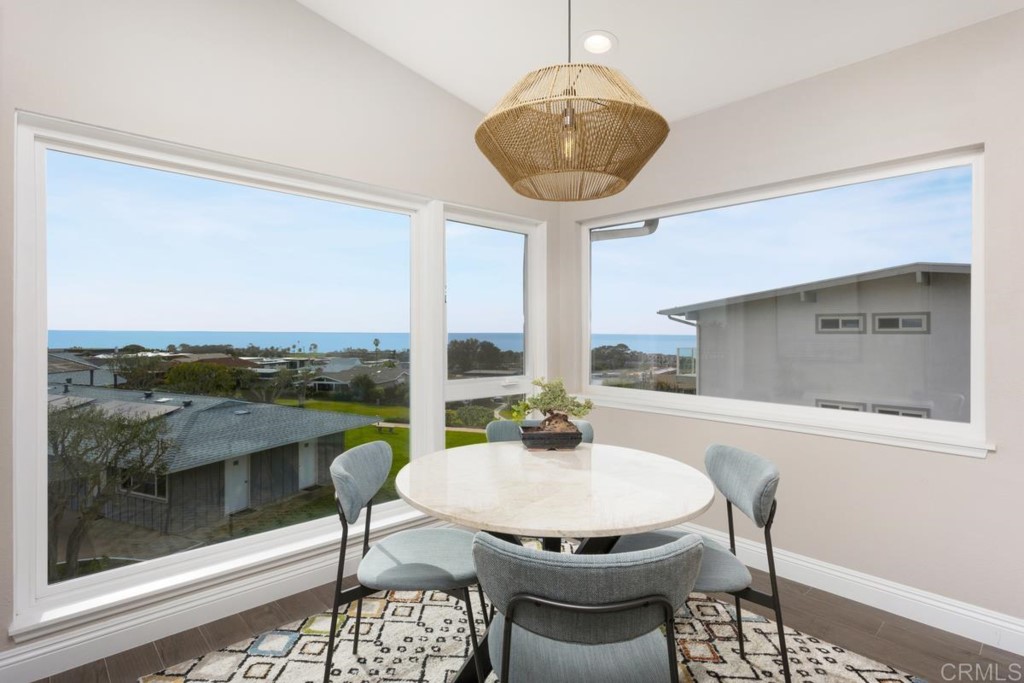 620 West Solana Circle, Unit 3A Solana Beach, CA 92075 - Photo 8 of 37 a view of a dining room with furniture window and outside view