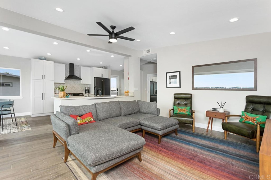620 West Solana Circle, Unit 3A Solana Beach, CA 92075 - Photo 10 of 37 a living room with furniture and kitchen view
