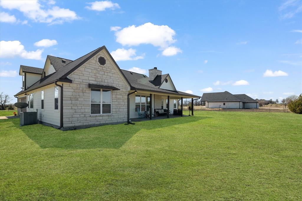 2885 Enloe Road Howe, TX 75459 - Photo 38 of 39 a view of a house with a big yard