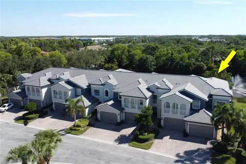 an aerial view of a house with a garden