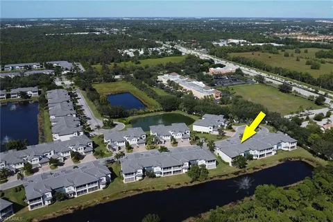 an aerial view of lake residential house with outdoor space