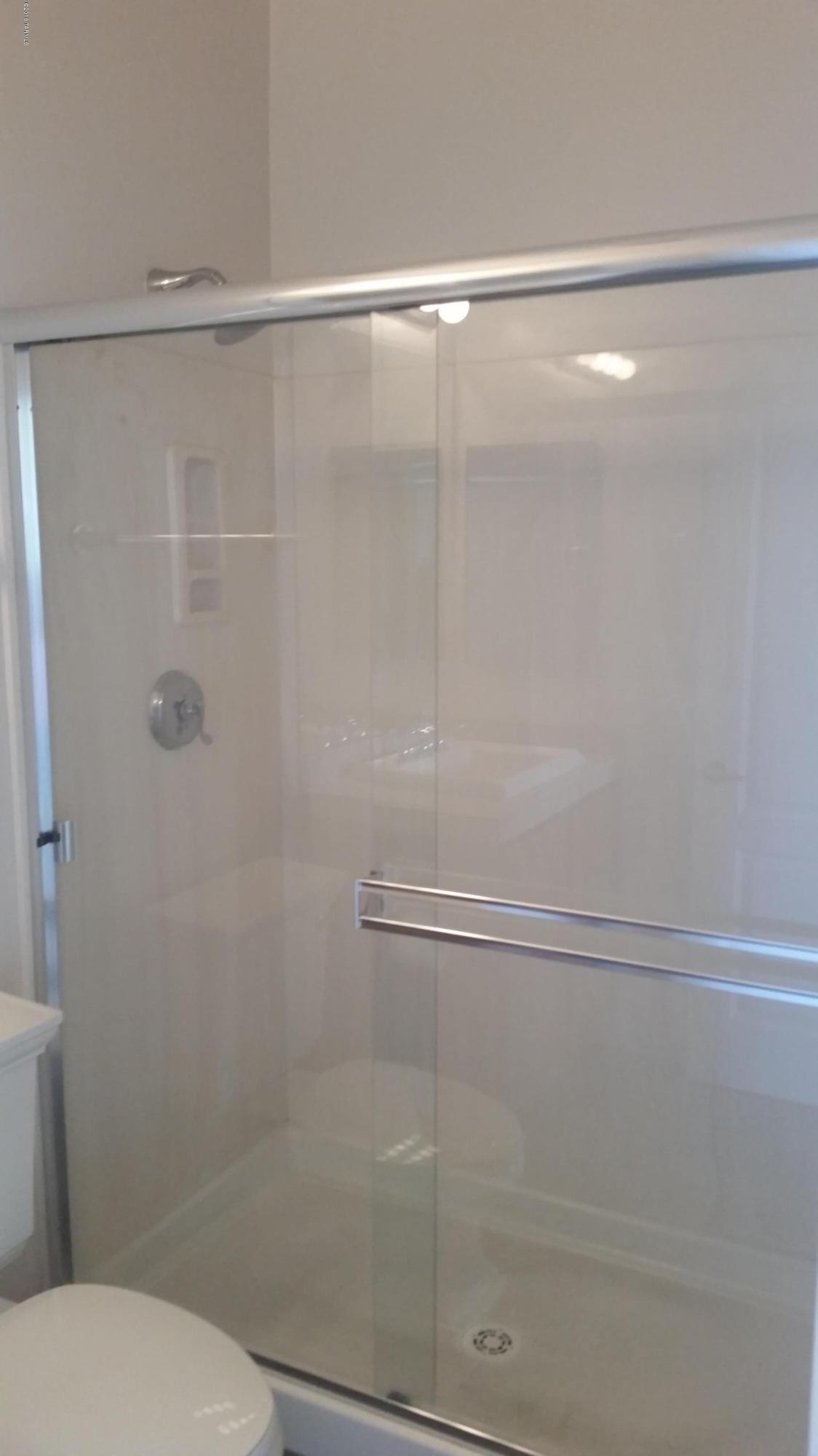 478 East Cedarvale Road Tucson, AZ 85704 - Photo 30 of 39 a bathroom with a shower