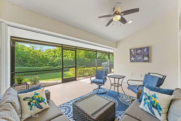 a view of a swimming pool and lounge chair