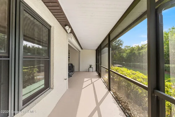a kitchen with stainless steel appliances granite countertop a sink and a refrigerator