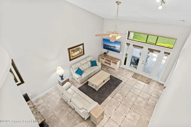 a view of a house with swimming pool and porch