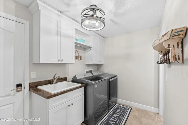 a view of a house with pool and a outdoor space