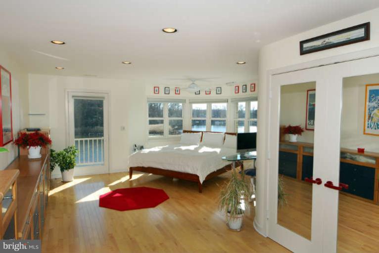 770 South River Landing Road, Unit 770 Edgewater, MD 21037 - Photo 14 of 30 Master bedroom has hardwood floors & deluxe bathrm