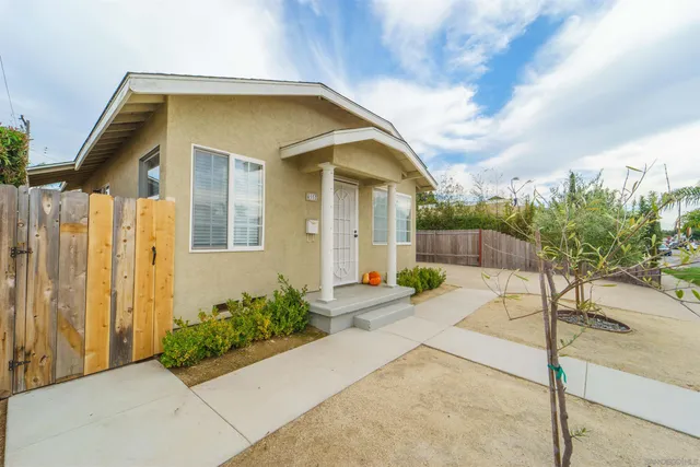 a front view of a house having yard