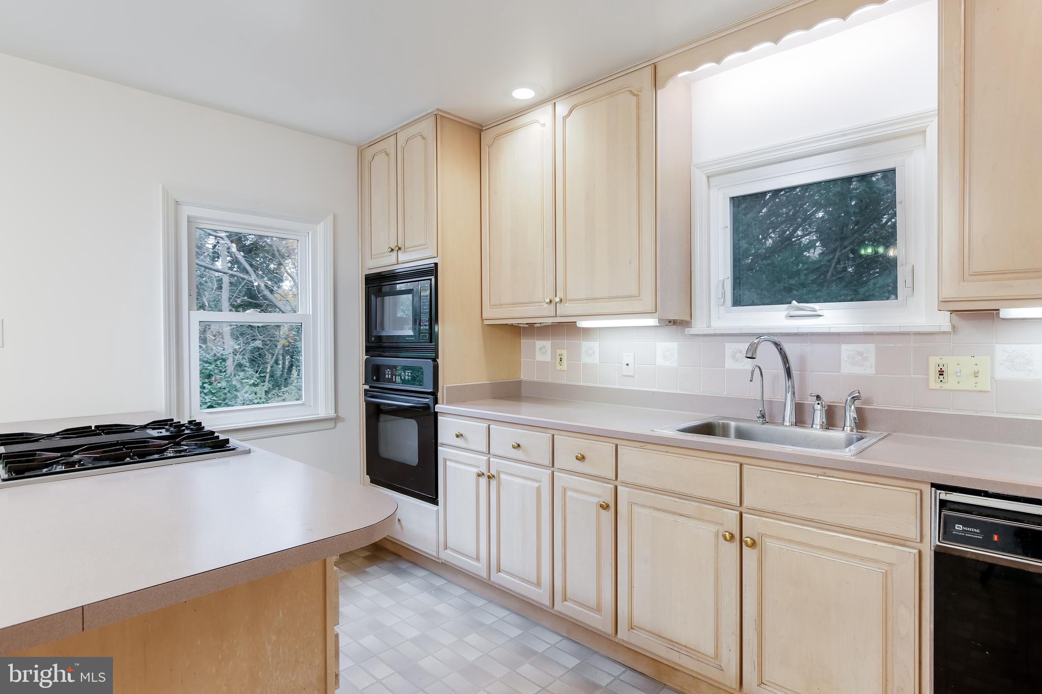 123 Greenridge Road Lutherville-Timonium, MD 21093 - Photo 13 of 34 Kitchen with large island and windows