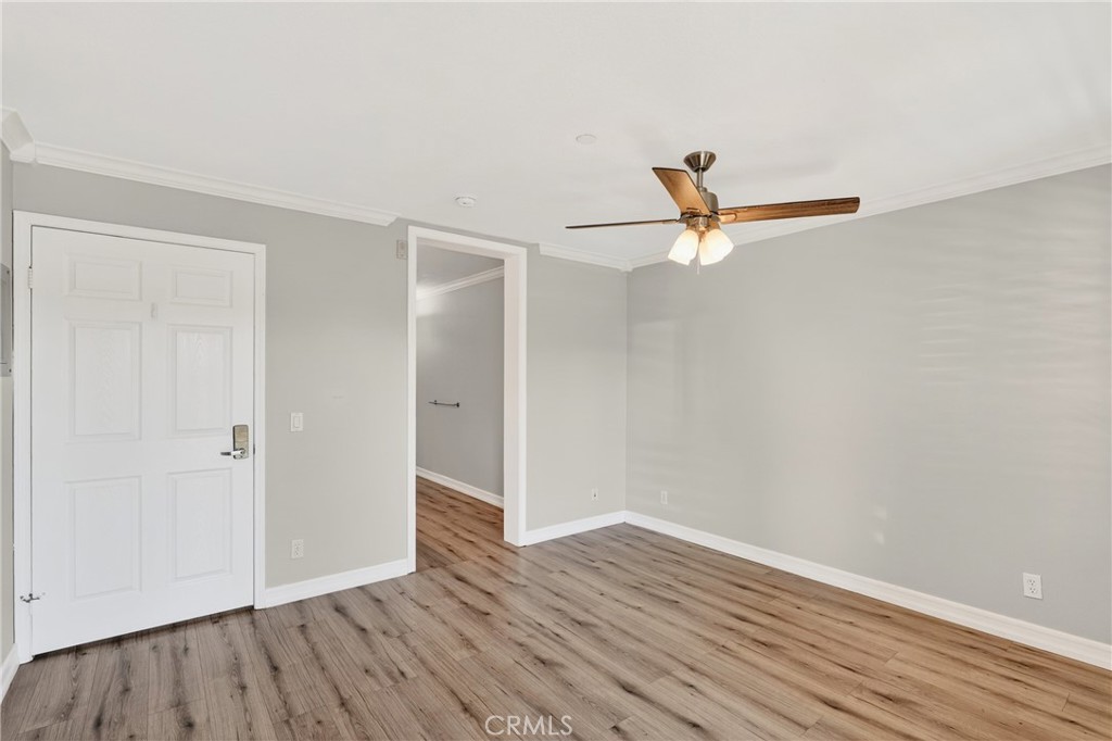 4 Palladium Lane Ladera Ranch, CA 92694 - Photo 16 of 38 a view of empty room with wooden floor and ceiling fan