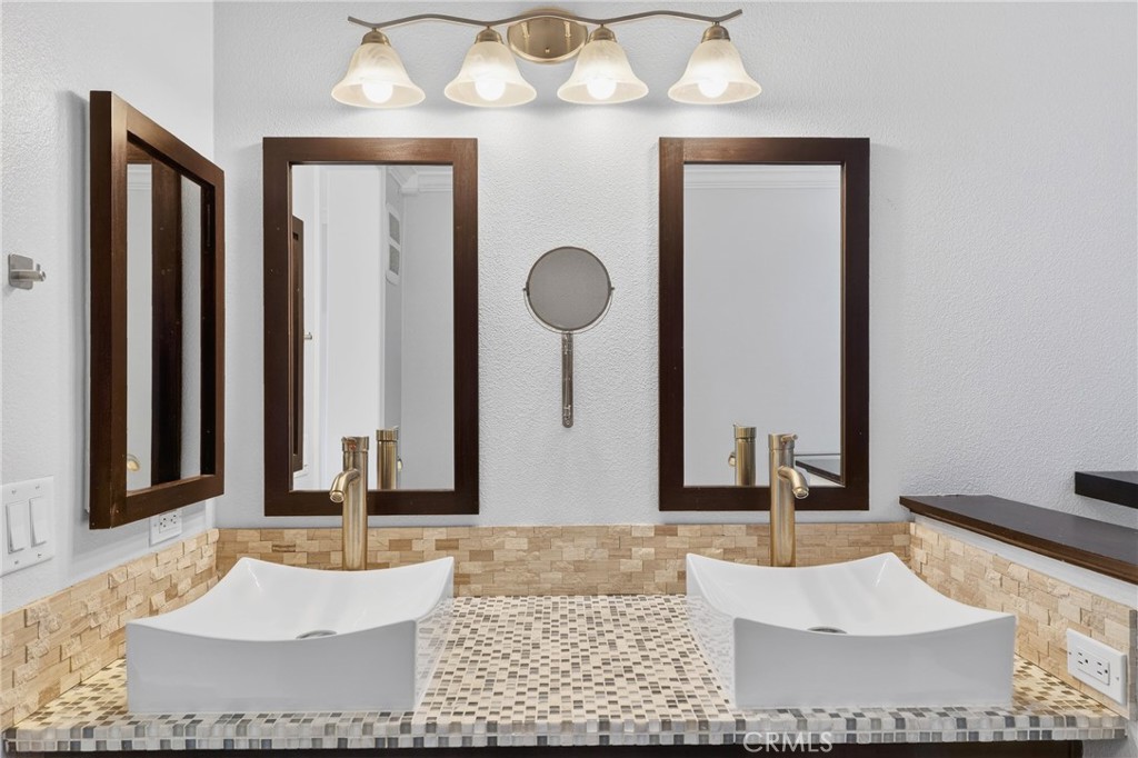 4 Palladium Lane Ladera Ranch, CA 92694 - Photo 18 of 38 a living room with furniture and a large mirror