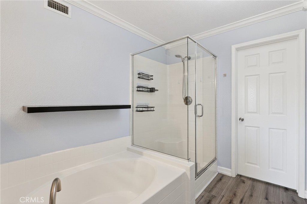 4 Palladium Lane Ladera Ranch, CA 92694 - Photo 19 of 38 a bathroom with a shower and a glass door