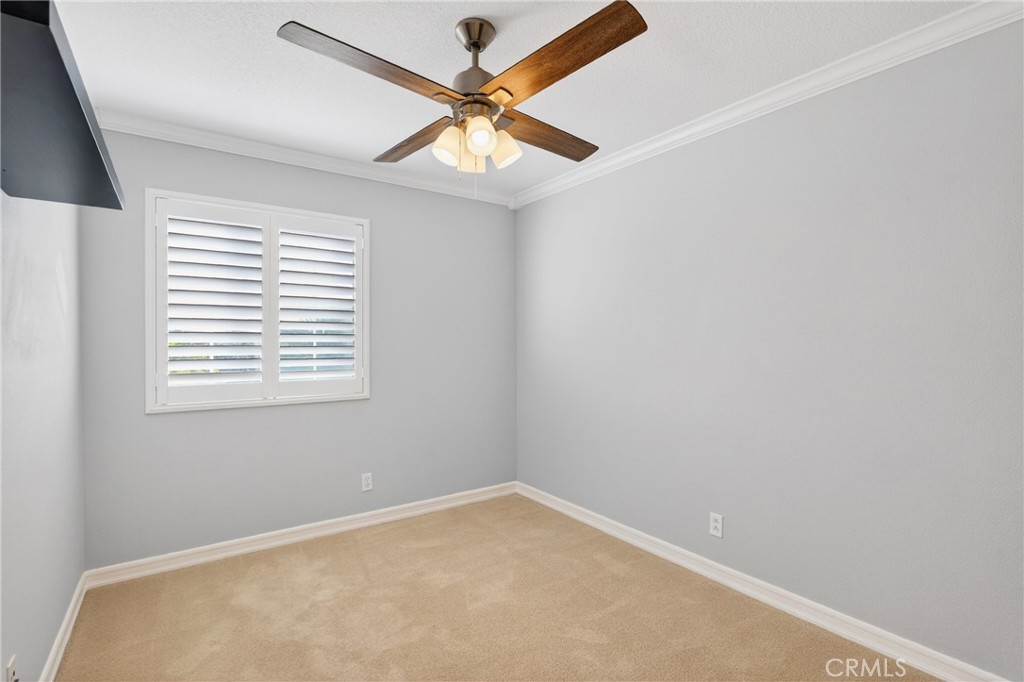 4 Palladium Lane Ladera Ranch, CA 92694 - Photo 26 of 38 an empty room with a window and a fan