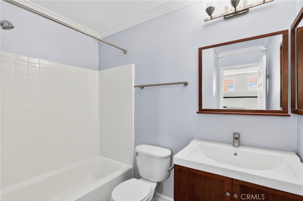 4 Palladium Lane Ladera Ranch, CA 92694 - Photo 28 of 38 a bathroom with a toilet a sink and bathtub