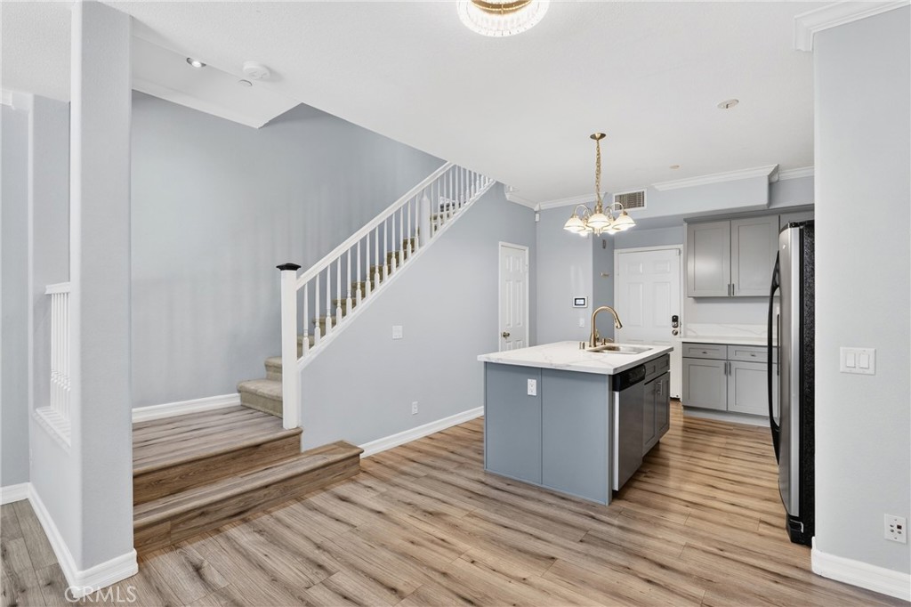 4 Palladium Lane Ladera Ranch, CA 92694 - Photo 6 of 38 a view of kitchen with sink microwave and stove