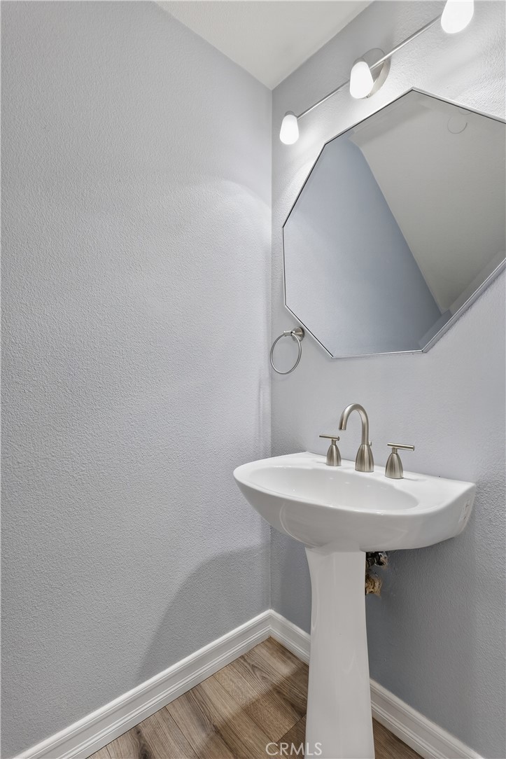 4 Palladium Lane Ladera Ranch, CA 92694 - Photo 10 of 38 a bathroom with a sink a mirror and vanity