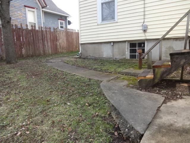 520 Villa Street Elgin, IL 60120 - Photo 14 of 16 a view of a house with a yard