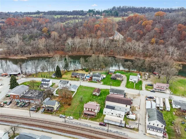 an aerial view of a swimming pool and mountain view