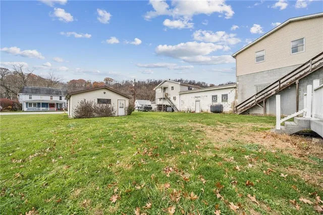 a house view with a garden space