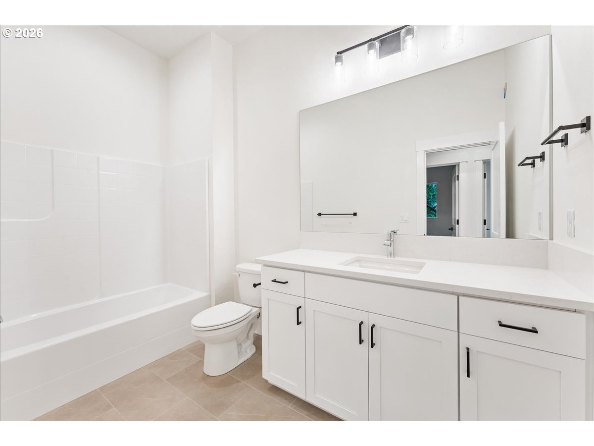 737 Southeast Forest Glen Road Estacada, OR 97023 - Photo 32 of 47 a bathroom with a sink a toilet and shower