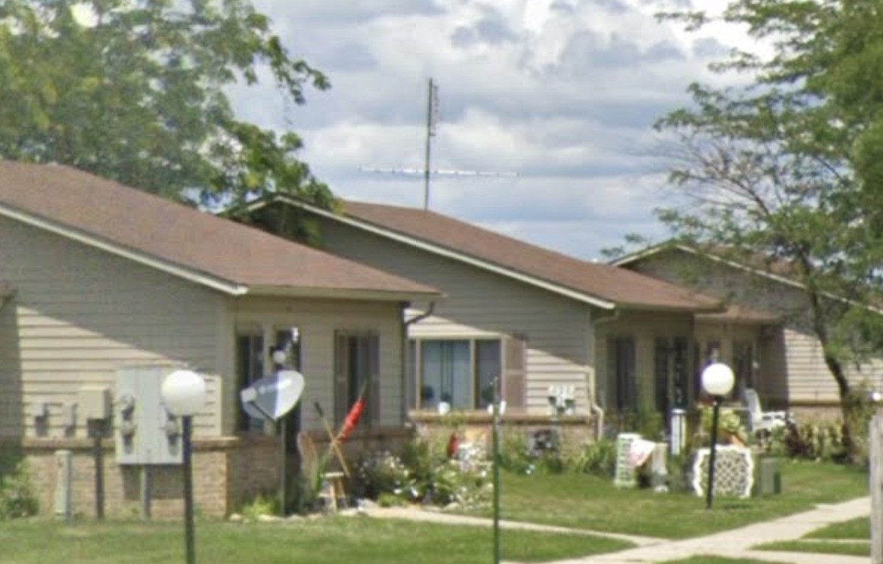 125 Shire Crest West Unity, OH 43570 - Photo 2 of 8 a front view of a house with a yard