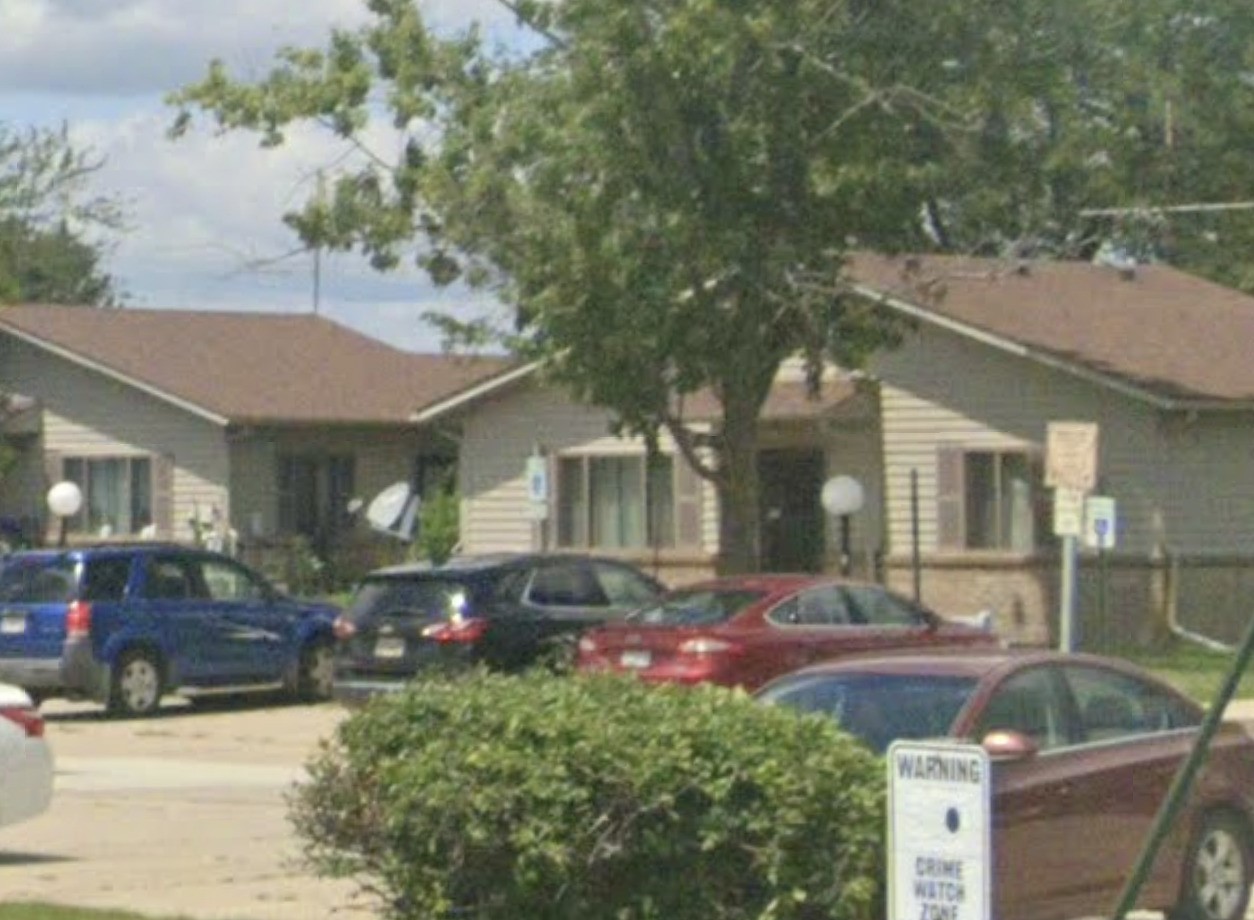 125 Shire Crest West Unity, OH 43570 - Photo 5 of 8 a front view of house with yard and trees around