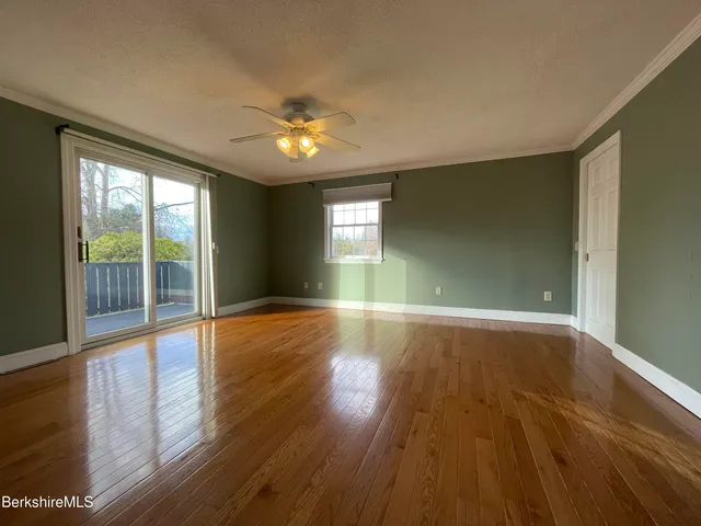 a view of a livingroom with a flat screen tv