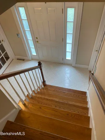 a view of empty room with windows