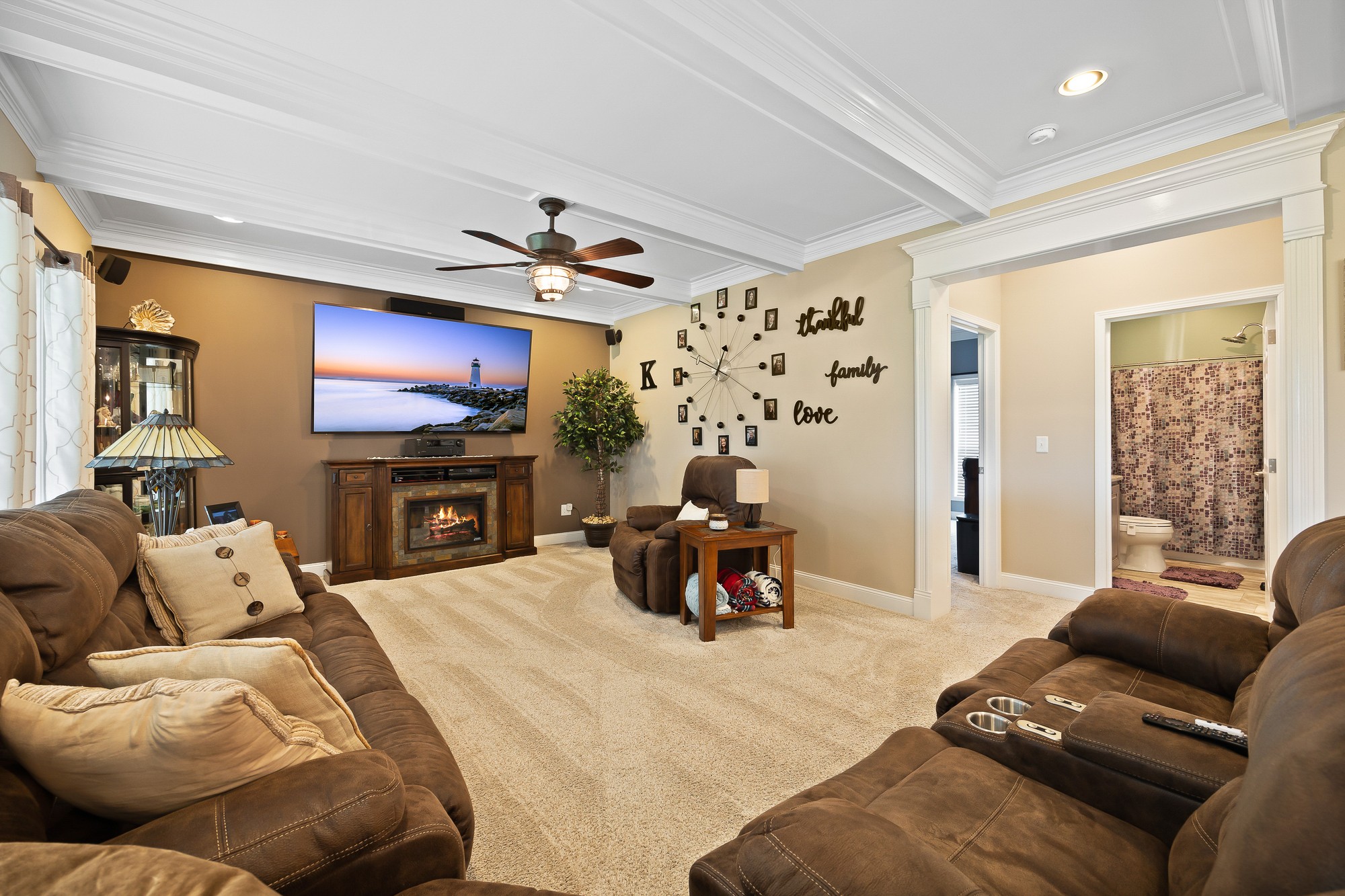 103 Molten Lane Hilham, TN 38568 - Photo 11 of 39 a living room with furniture a fireplace and a flat screen tv
