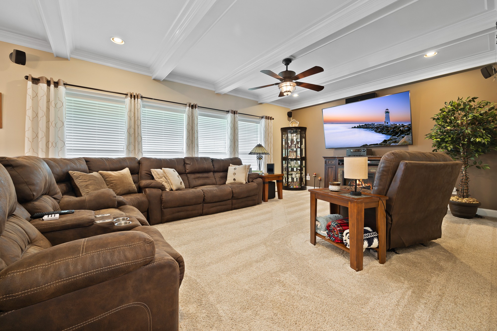 103 Molten Lane Hilham, TN 38568 - Photo 12 of 39 a living room with furniture a ceiling fan and a window