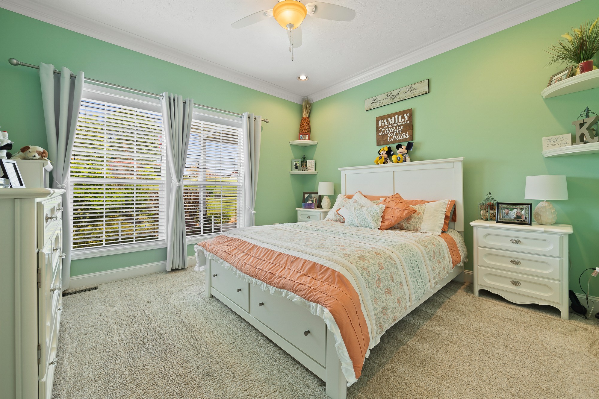 103 Molten Lane Hilham, TN 38568 - Photo 21 of 39 a bedroom with a bed and a chandelier